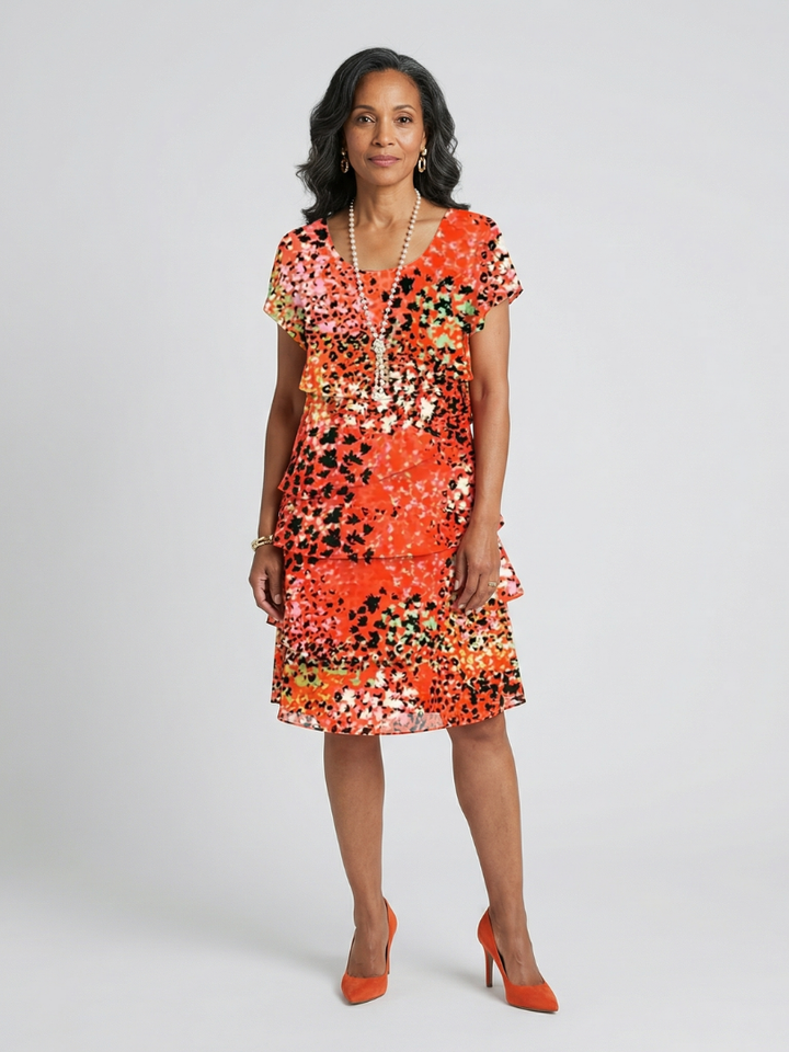 Evania | Robe longueur genou à volants mouchetée