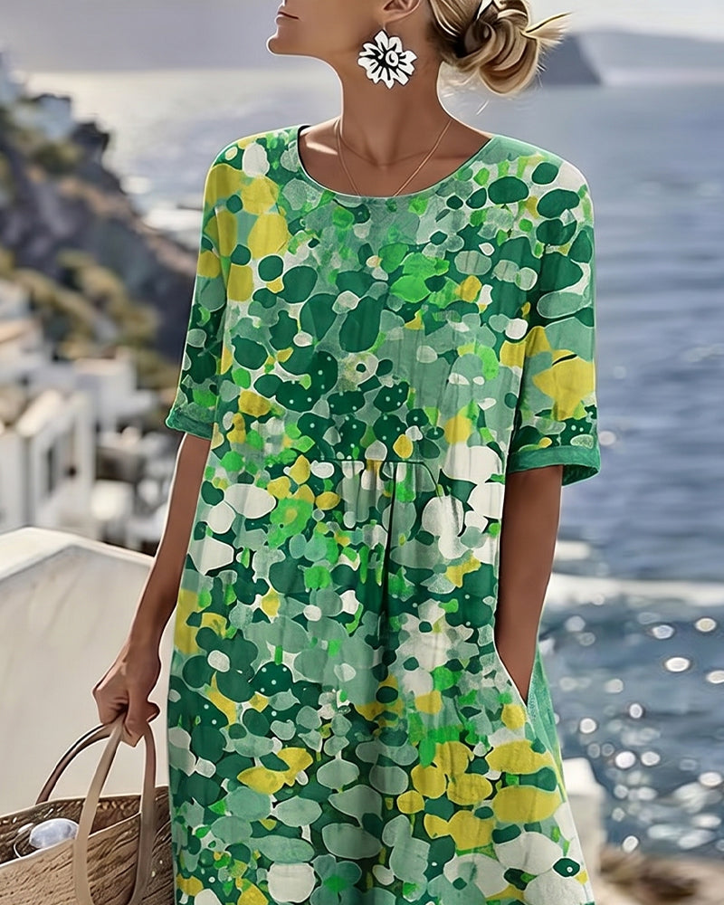 Angele - Robe mi-longue d'été à motif floral élégant