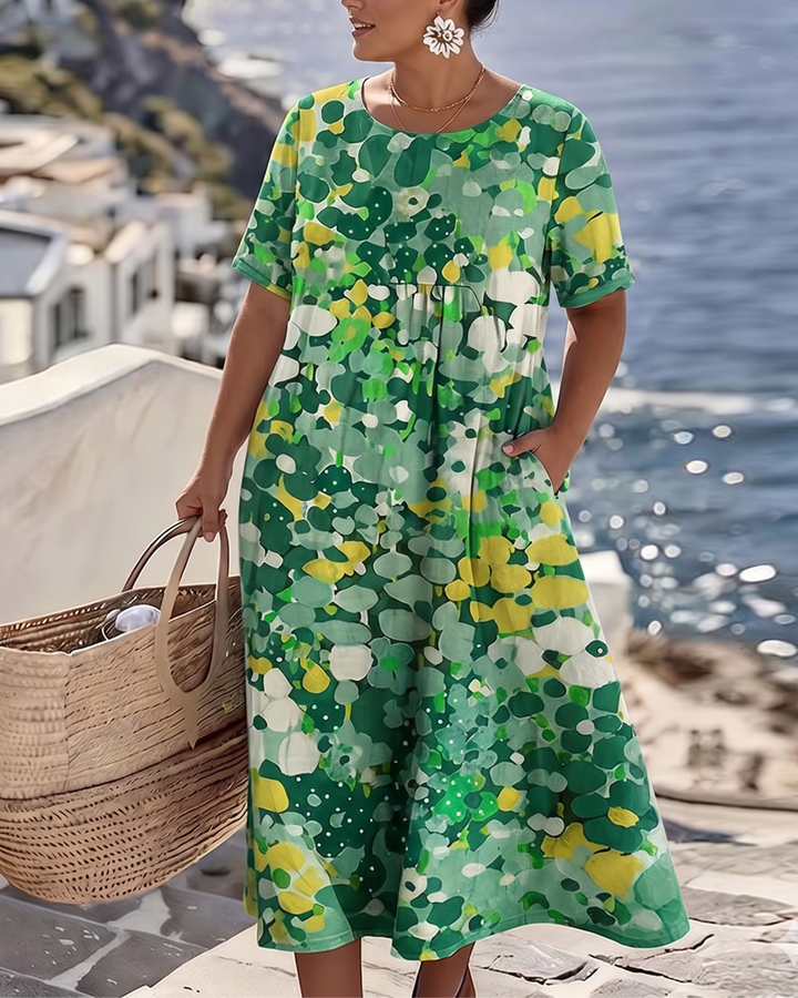 Angele - Robe mi-longue d'été à motif floral élégant