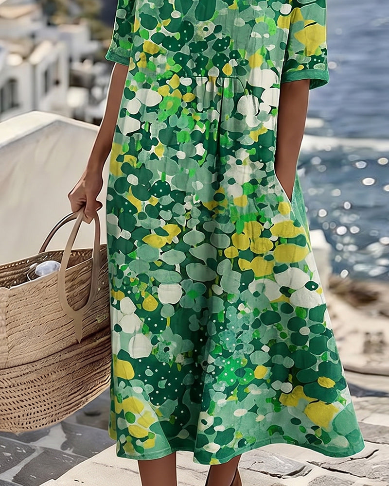 Angele - Robe mi-longue d'été à motif floral élégant