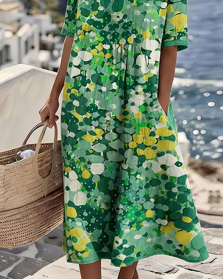 Angele - Robe mi-longue d'été à motif floral élégant