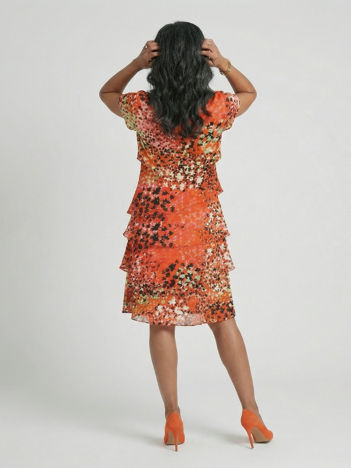 Evania | Robe longueur genou à volants mouchetée