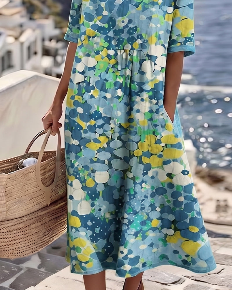 Angele - Robe mi-longue d'été à motif floral élégant