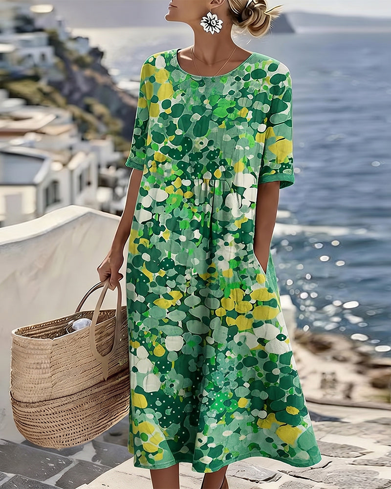 Angele - Robe mi-longue d'été à motif floral élégant