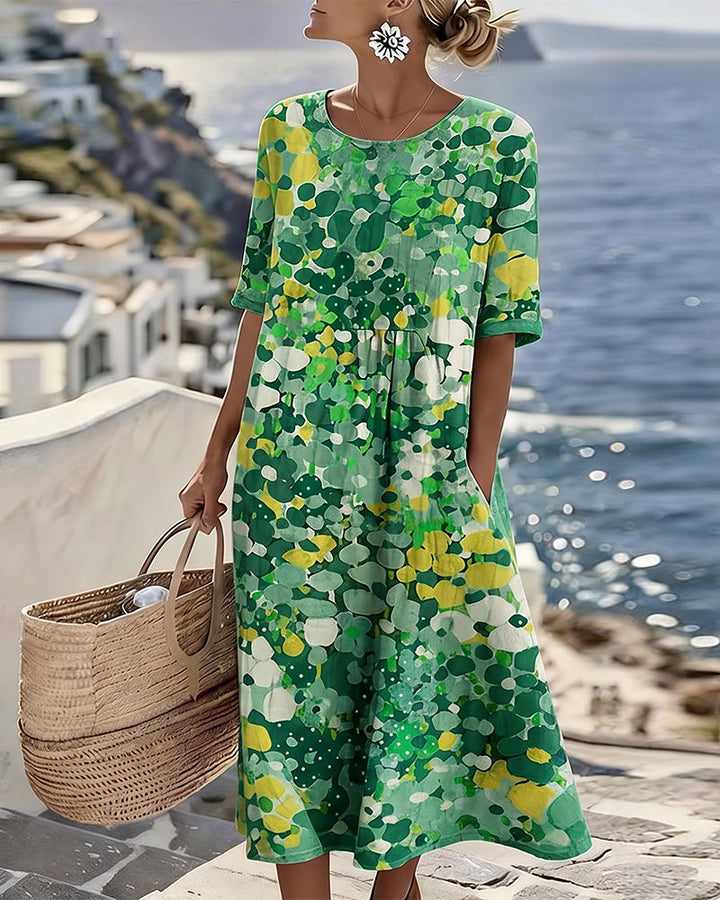 Angele - Robe mi-longue d'été à motif floral élégant