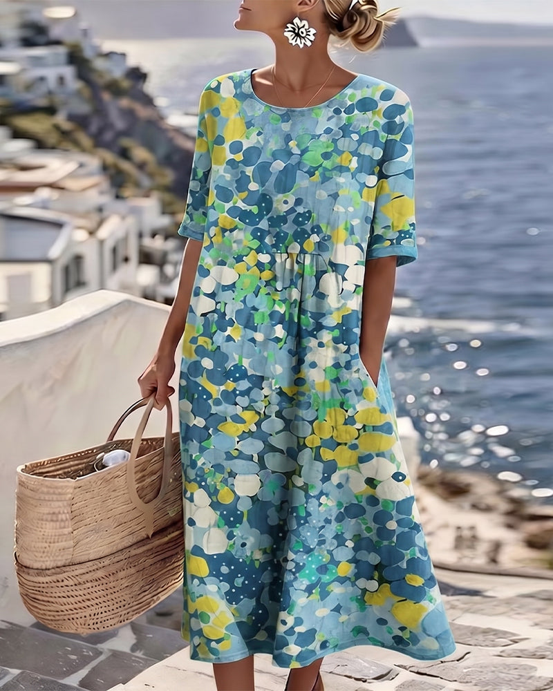 Angele - Robe mi-longue d'été à motif floral élégant