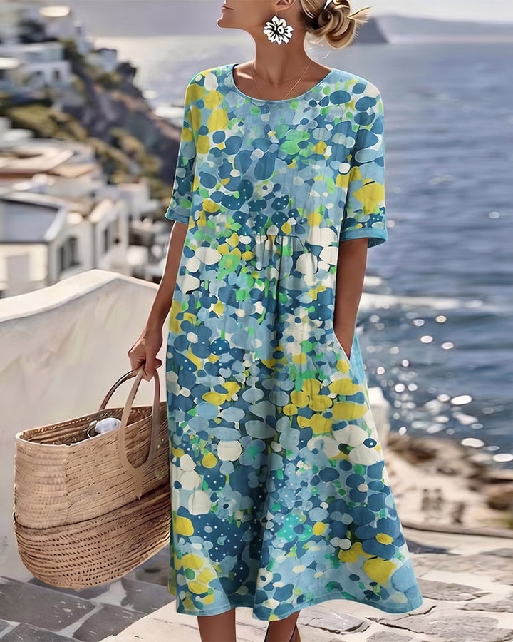 Angele - Robe mi-longue d'été à motif floral élégant