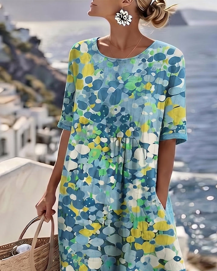 Angele - Robe mi-longue d'été à motif floral élégant