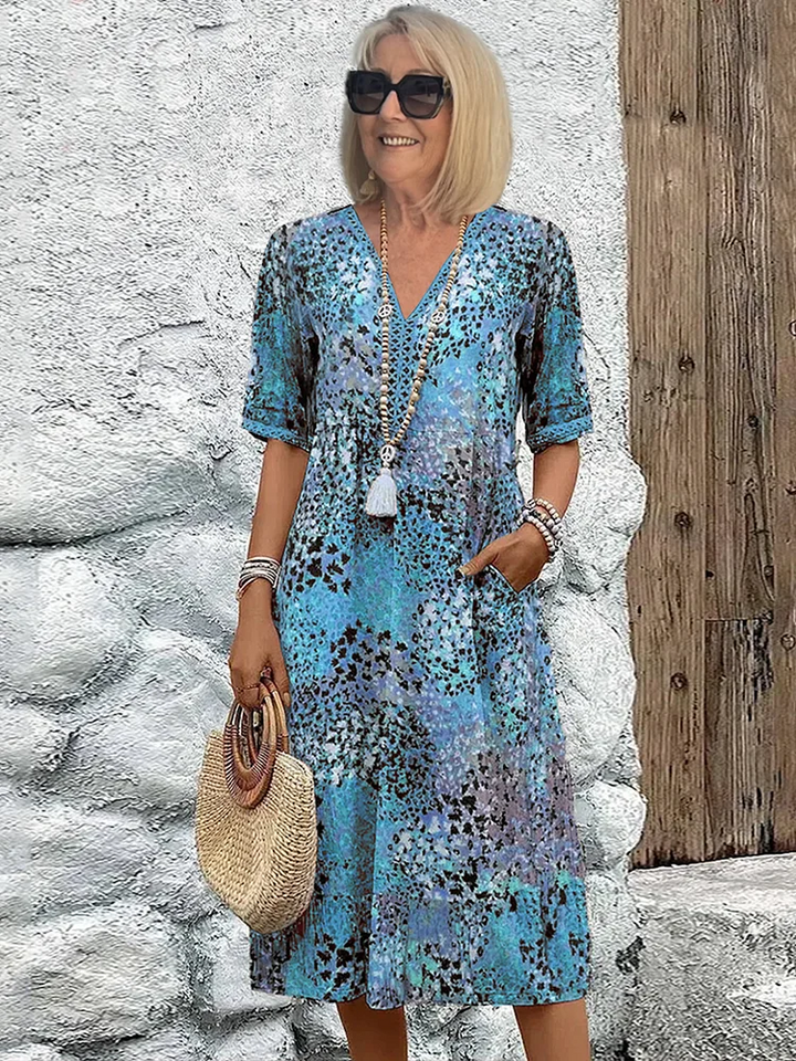 Elara | Robe midi élégante à imprimé